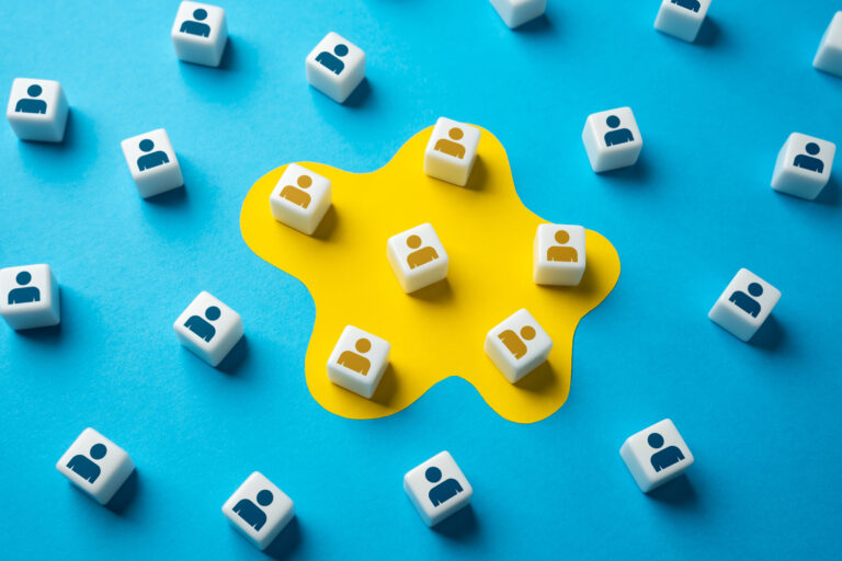 This image illustrates the concept of signal clarity in account-based marketing (ABM). The yellow cluster of buyer icons—distinct from the surrounding sea of blue—symbolizes the targeted identification of in-market buyer groups amidst a vast audience of lookalikes. Just as GTM teams often drown in disconnected intent data, this visual metaphor highlights the power of Buyer Group Intelligence: isolating true opportunity clusters from misleading noise to drive strategic revenue momentum.